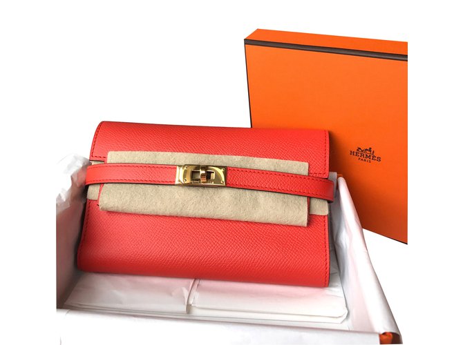 Hermès Kelly kompakte Geldbörse Orange Leder  ref.25289