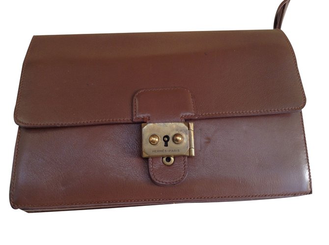 Hermès Clutch bag Brown Leather  ref.25935
