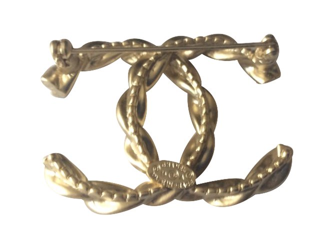 Chanel Broche Dourado Metal  ref.28864