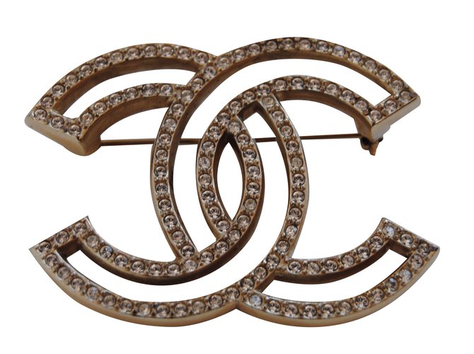 Chanel CC brooch Golden Metal  ref.29013