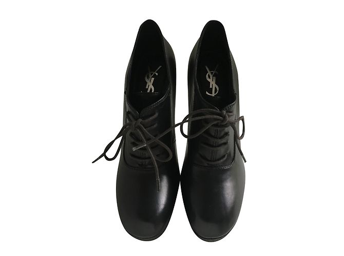 Stivaletti con lacci in pelle nera Yves Saint Laurent con plateau Nero