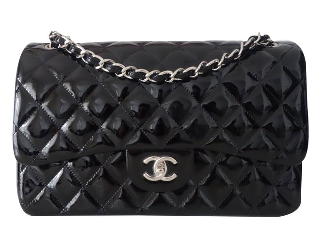 Timeless Chanel CLASSIQUE GM Black Leather  ref.33259