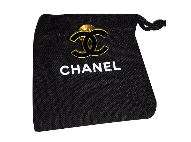 Chanel Alfileres y broches Negro Metal