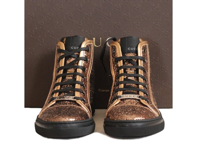 Gucci scarpe da ginnastica D'oro Pelle  ref.35018