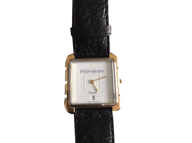 Yves Saint Laurent Relógio fino Dourado Banhado a ouro  ref.36682