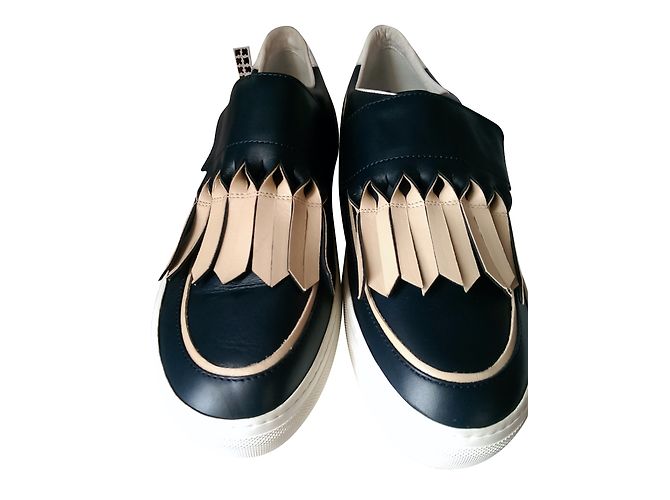 Baskets Tod's en cuir bleu avec franges rose champagne