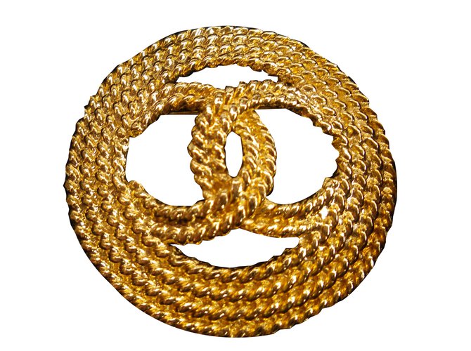 Chanel Alfinete & broche Dourado Metal  ref.37720