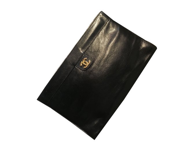 Chanel Clutch bag Black Navy blue Leather  ref.38311