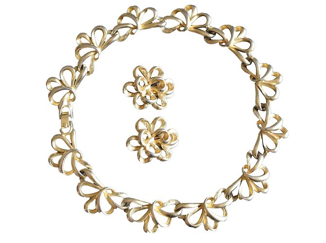Autre Marque Collier et boucles d'oreilles en plaqué or Doré