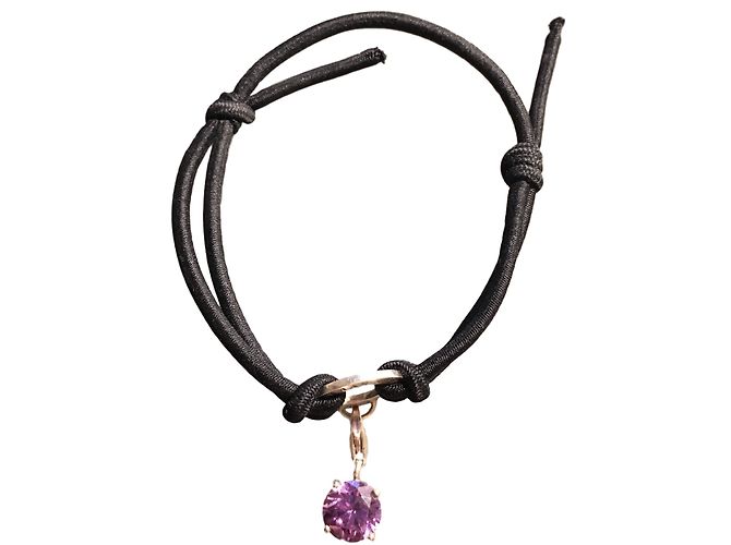 Thomas Sabo Armband aus schwarzer Kordel mit violettem Stein Silber