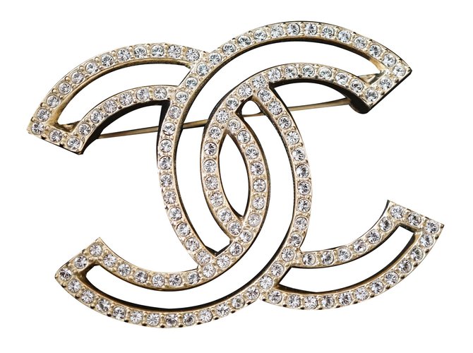 Chanel Alfinete & broche Dourado Metal  ref.38565