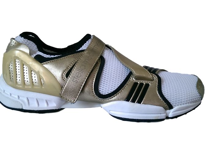 Stella Mc Cartney Sneakers Stella McCartney in pelle bianca e oro Nero Bianco D'oro