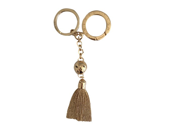 Louis Vuitton Amuletos bolsa Dorado Metal  ref.39525