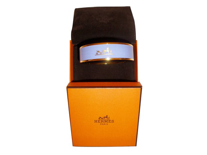 Hermès: Bracelet " CALÈCHE " en Email/ Plaqué or. Taille L  ref.42175