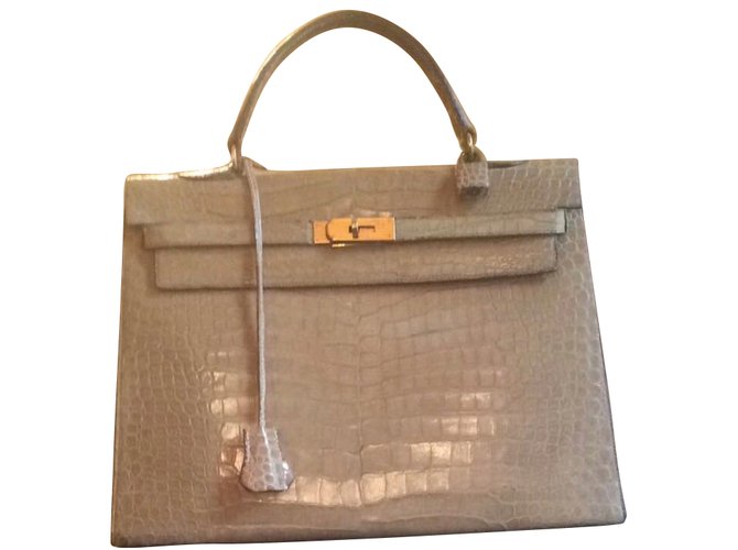 Hermès Kelly 35 vintage crocodile Beige Exotic leather  ref.43089