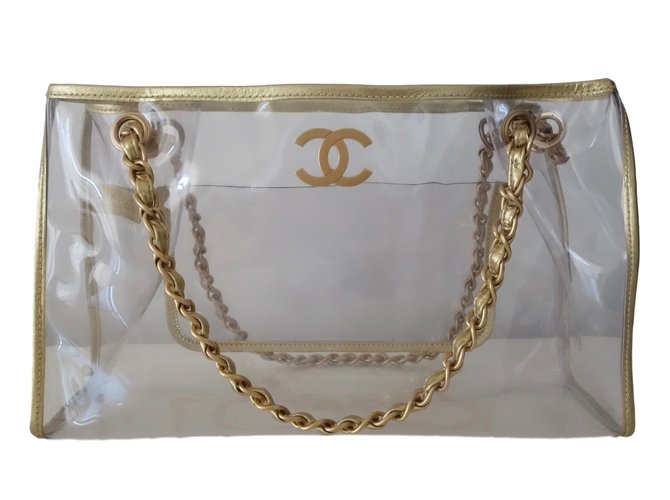 Chanel Bolsas Dourado Plástico  ref.44614