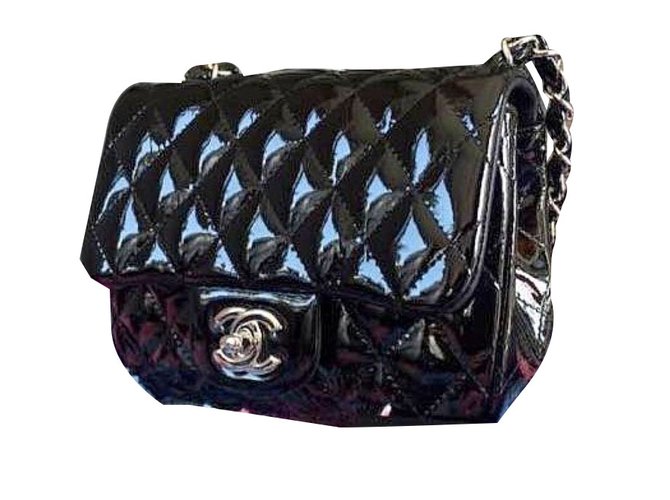 Chanel Mini borsa con patta Nero Pelle verniciata  ref.45447