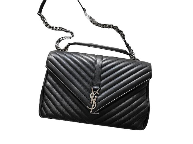 Yves Saint Laurent Vintage Black Suede Multicolor Tassel Bucket Bag  ref.830085 - Joli Closet