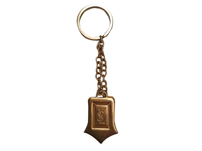 Yves Saint Laurent Tasche / Schlüsselanhänger Golden Metall  ref.46210