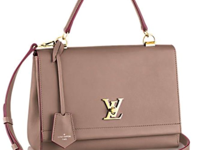 The Miller Affect wearing a taupe LockMe bag from Louis Vuitton