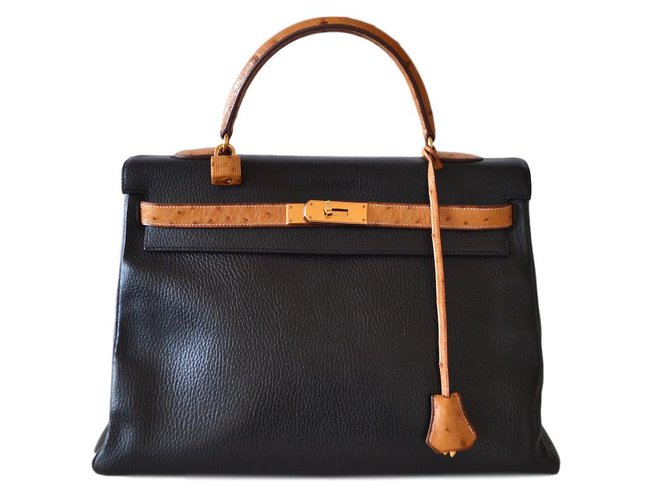 Kelly Hermès Handbags Black Beige Exotic leather  ref.47374