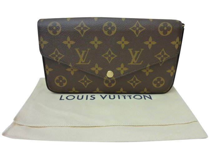 Louis Vuitton Clutch-Taschen Braun Leder Leinwand  ref.52728