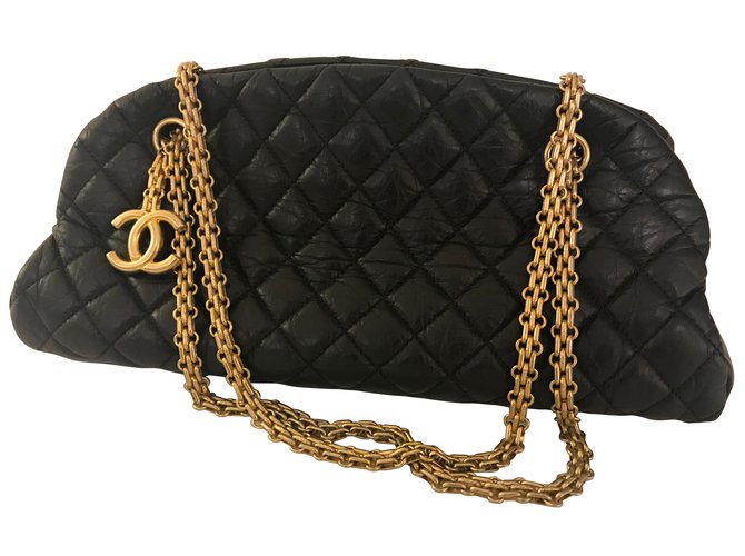 Bolso bandolera hermosa Chanel Chain Mademoiselle en piel de becerro acolchada envejecida. Negro Cuero  ref.56906