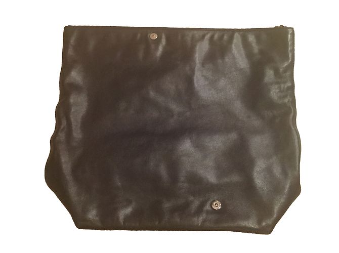 Clutch asimétrica Jil Sander en piel azul