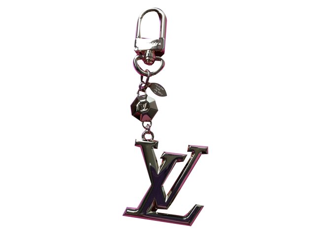 Louis Vuitton Amuleto bolsa Dorado Metal  ref.59024