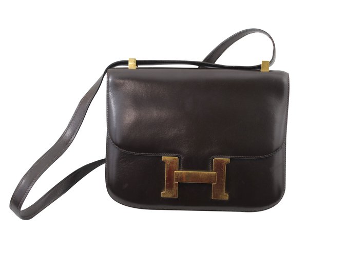 Constance Hermès Handbags Dark brown Leather  ref.59636