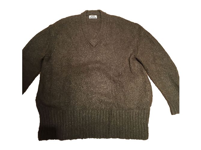 Suéter Acne oversize de lana cuello en V caqui 