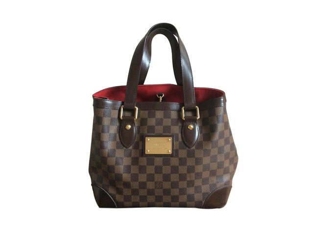sac louis vuitton avec plaque