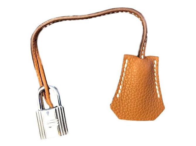 Hermès Clochette y taquilla