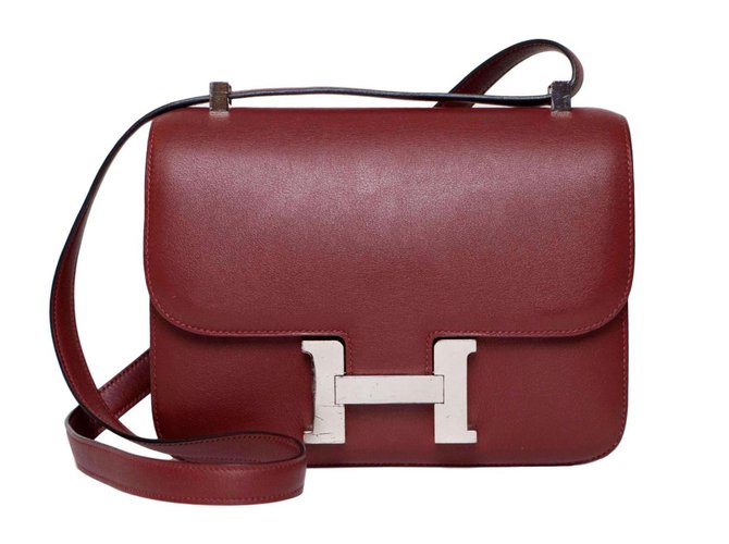 Hermès Constance 24 Dark red Leather  ref.63340