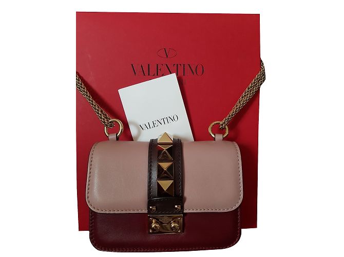 Mini borsa Valentino GLAM LOCK in pelle rosa e bordeaux Bordò