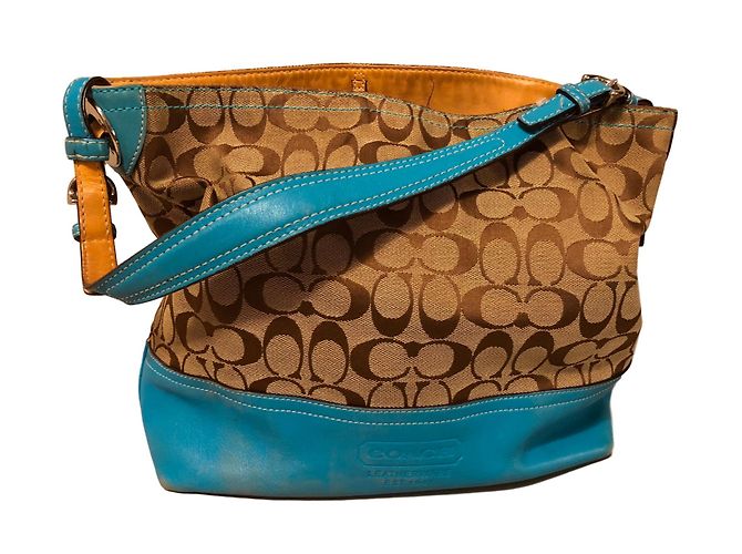Coach Handtasche aus Stoff und Leder mit Logo