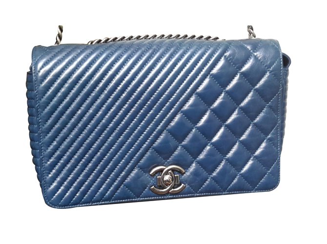 Chanel Handbags Blue Leather  ref.66096