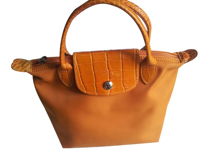 Longchamp Handbags Orange Synthetic  ref.67572