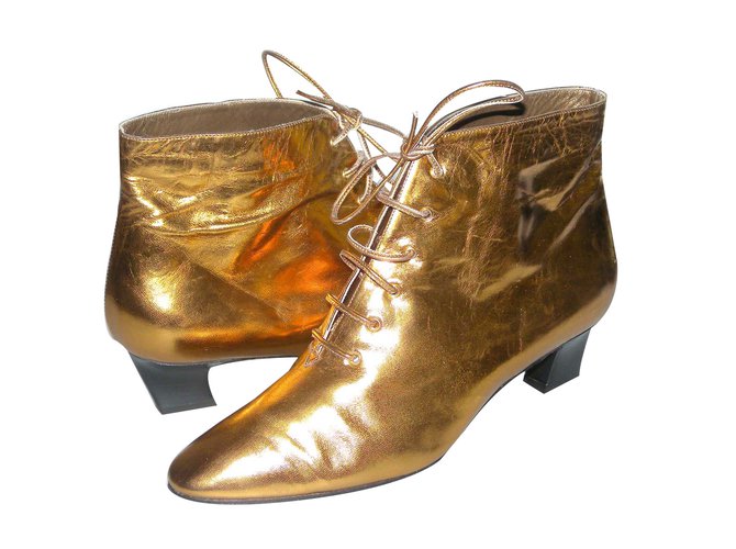 Yves Saint Laurent Ankle Boots Golden Leather  ref.67922