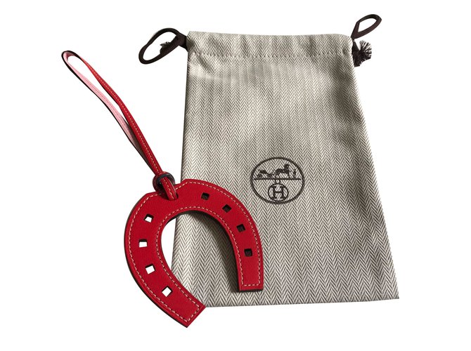 Bijou de sac Hermès Paddock cuir orange 