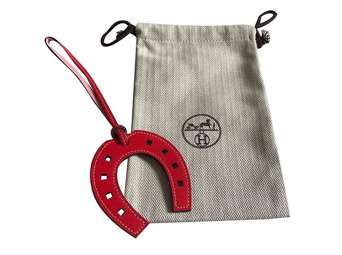 Charm per borsa Hermès Paddock pelle arancione 