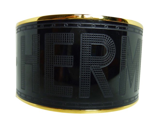Hermès Bracelet Métal Plaqué or Noir Doré  ref.68889