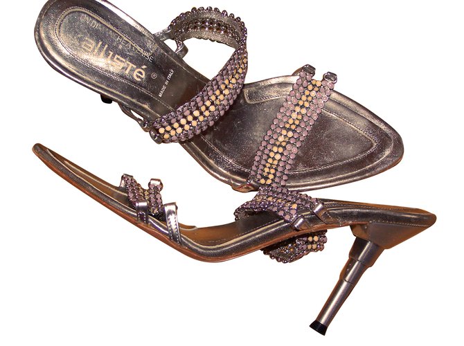Autre Marque Sandals Multiple colors Metallic Leather Metal  ref.71005