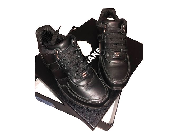 Sneakers Chanel in pelle nera e tweed Nero
