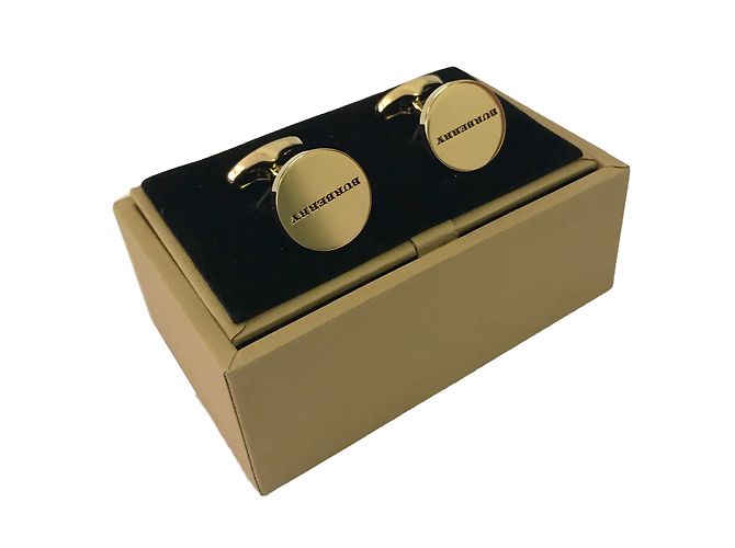 Abotoaduras Burberry ovais com logo douradas Dourado