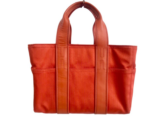 Hermès Acapulco Handbag Orange Leather Cloth  ref.71673