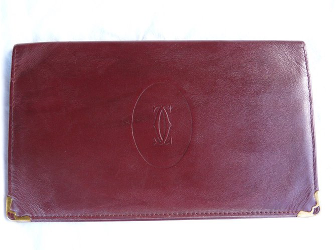Cartier Purses, wallets, cases Dark red Leather  ref.71835