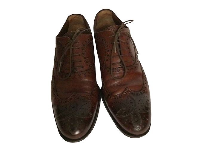 Louis Vuitton lacci alari Marrone Pelle
