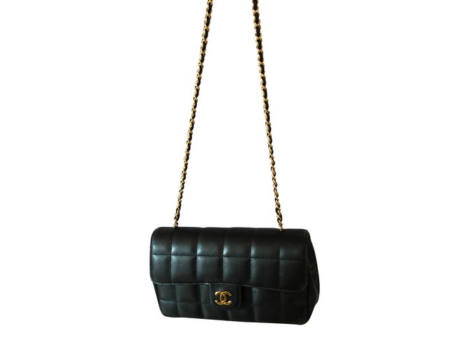 Chanel mini Black Leather  ref.73674
