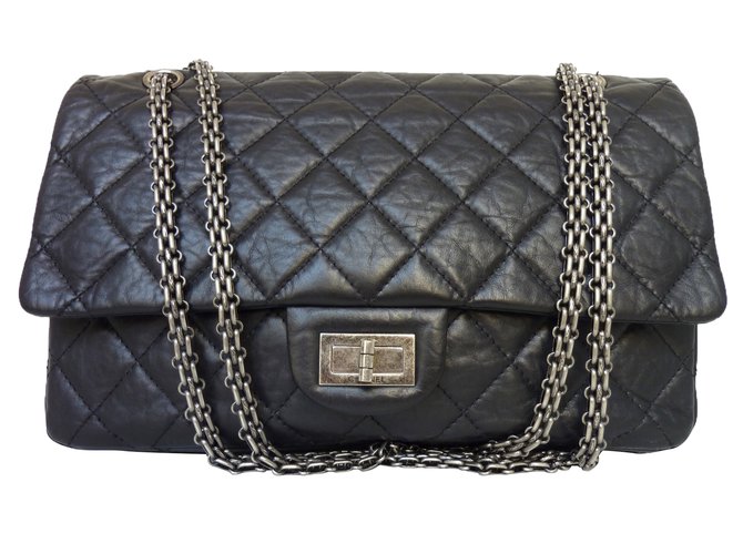 L'iconique Chanel 2.55 Reissue en cuir vieilli matelassé noir en très bon état !  ref.73728